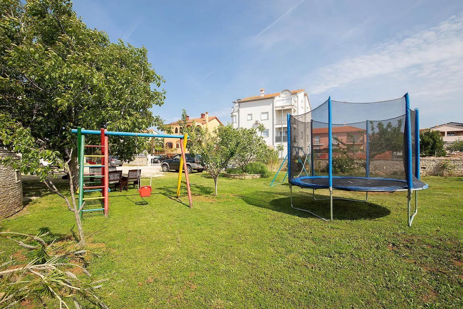 Modern Stone House With Flowers & Playground Medolino